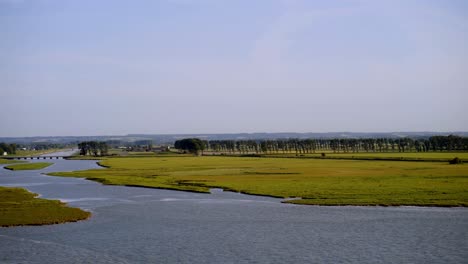 dutch river and farmland landscape