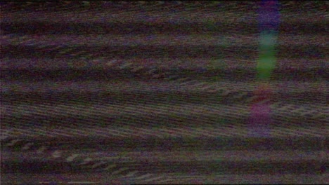 vhs screen digital glitch and noise. videotape rewind mode. black white static noise motion.old film grunge on black background realistic flickering