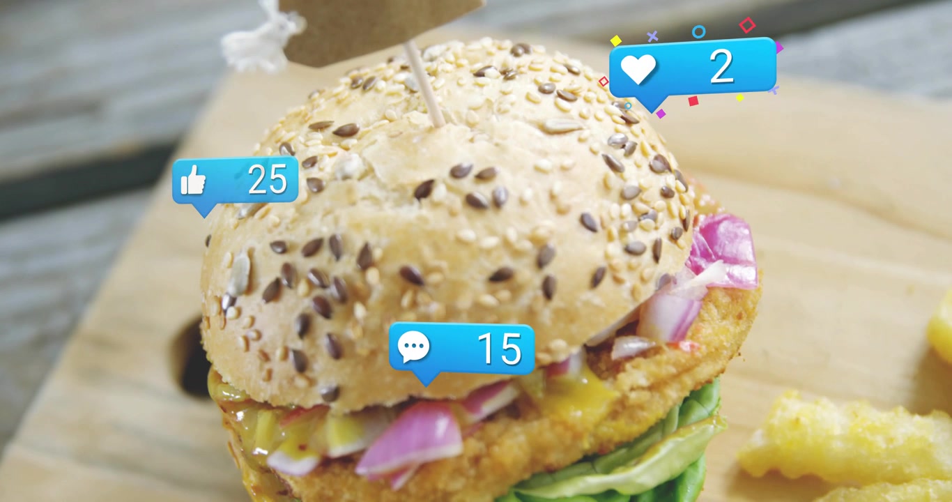 Burger drawing popping likes or comments bubbles after social spike, camera moving down to show frie