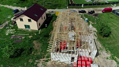 aerial view of the construction of a roof with wooden trusses