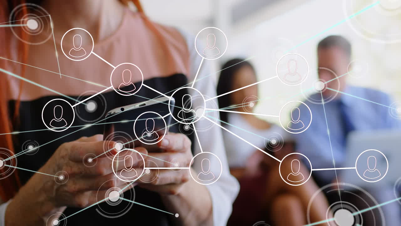 Animation of network of profiles over mid section of a businesswoman using smartphone at office