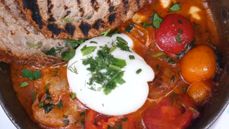 poached eggs with sausage and toast