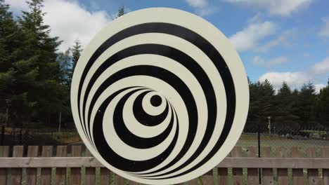 visual effect optical illusion monochrome black and white turning and spinning circles