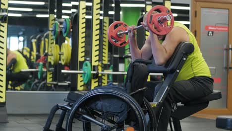 man with disabilities training in the gym of rehabilitation center