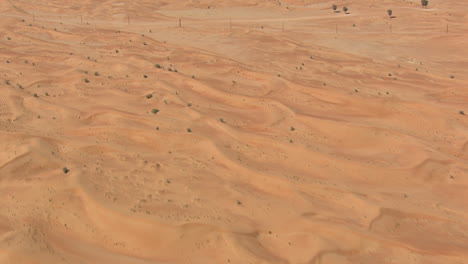 Desert-dunes-seen-from-the-sky-with-slight-tiltdown