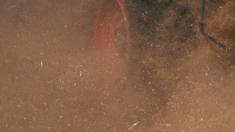 slowmotion auf wheat dust behind a combine harvester in magdeburg, germany