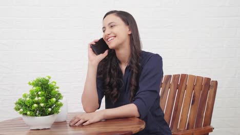 indian girl talking on a call