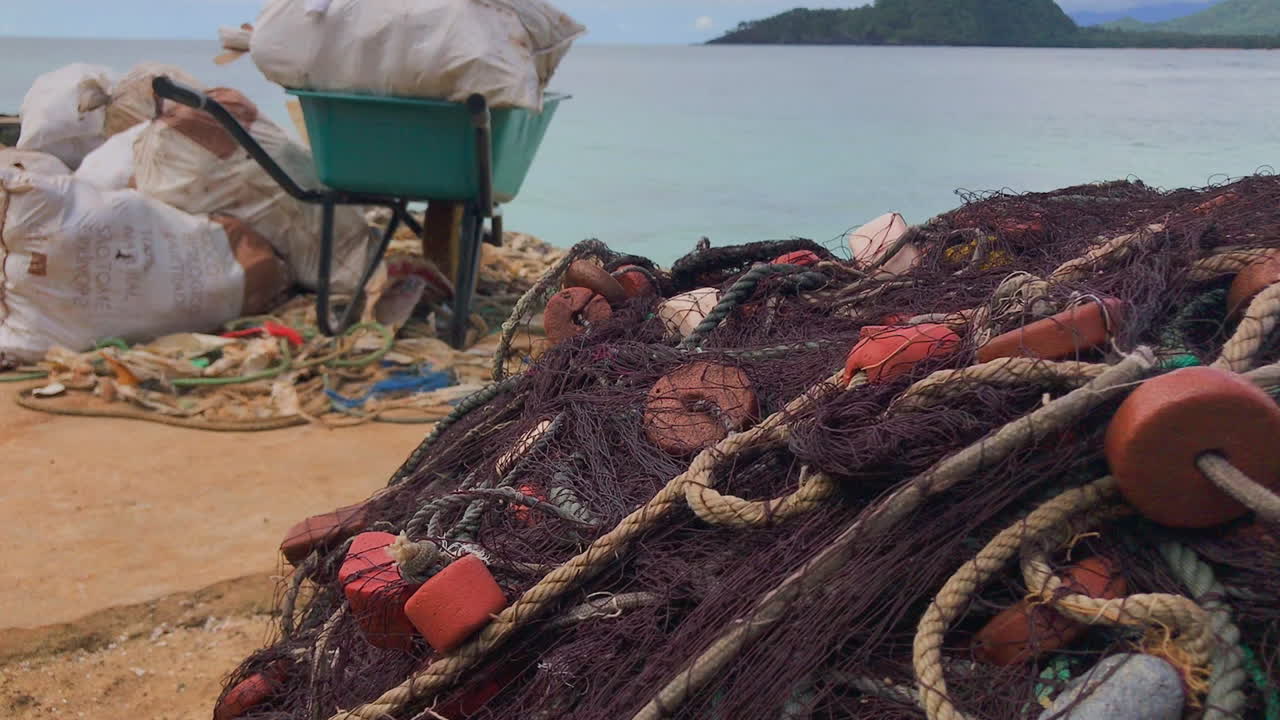 Traditional fishing net pile ready to pull, African island