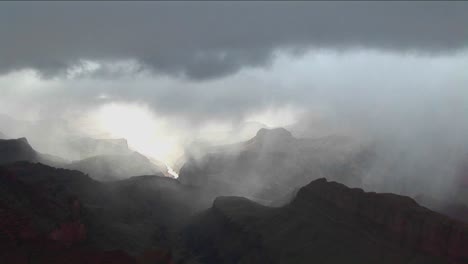 a time lapse of clouds moving over layers of mountains in grand canyon national park in arizona