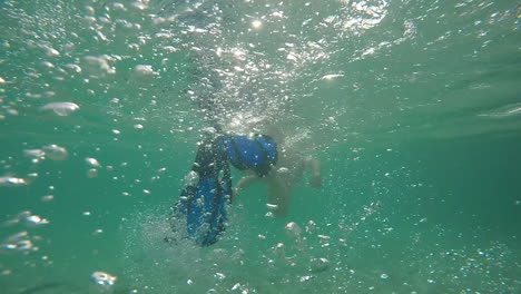 Footage-of-snorkelling-fins-from-behind-60fps