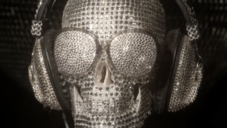 amazing diamond covered skull with  headphones and sunglasses