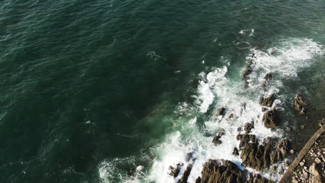 sea-waves-hitting-a-rock-formation-on-the-shore-of-the-coast