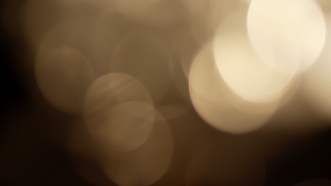 Multicolored light leaks 4k footage on black background. Stylizing video, transitions. Bokeh effect