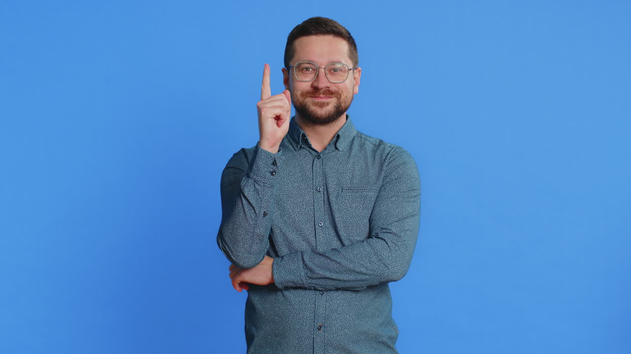 Inspired young man having good idea plan startup showing inspiration motivation eureka gesture