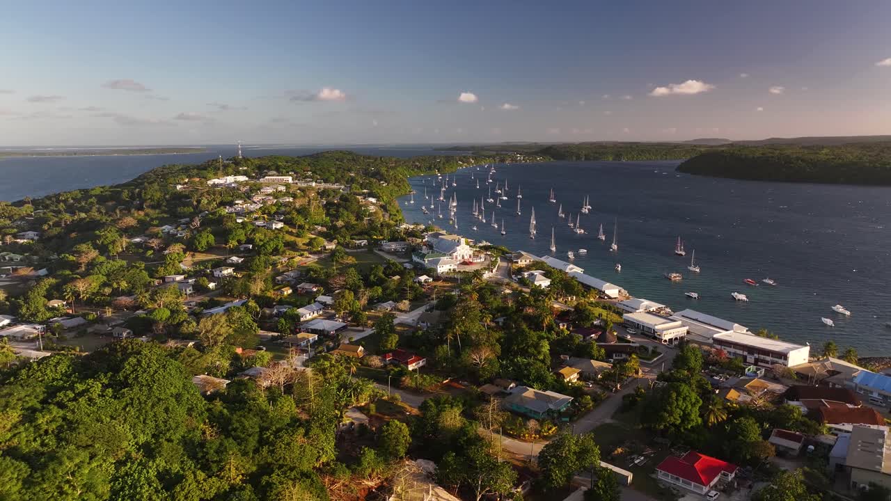 Beautiful coastal scenery Neiafu, Tonga. Historic church and waterfront with anchored boats. Vava'u Island. Aerial