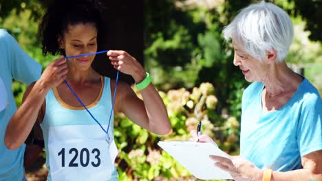 athletes registering themselves for marathon 4k