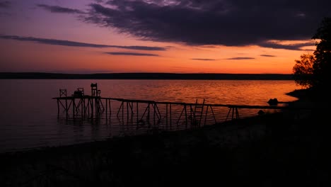 the setting sun poured color into the evening water.the bridge led into a magical night world.