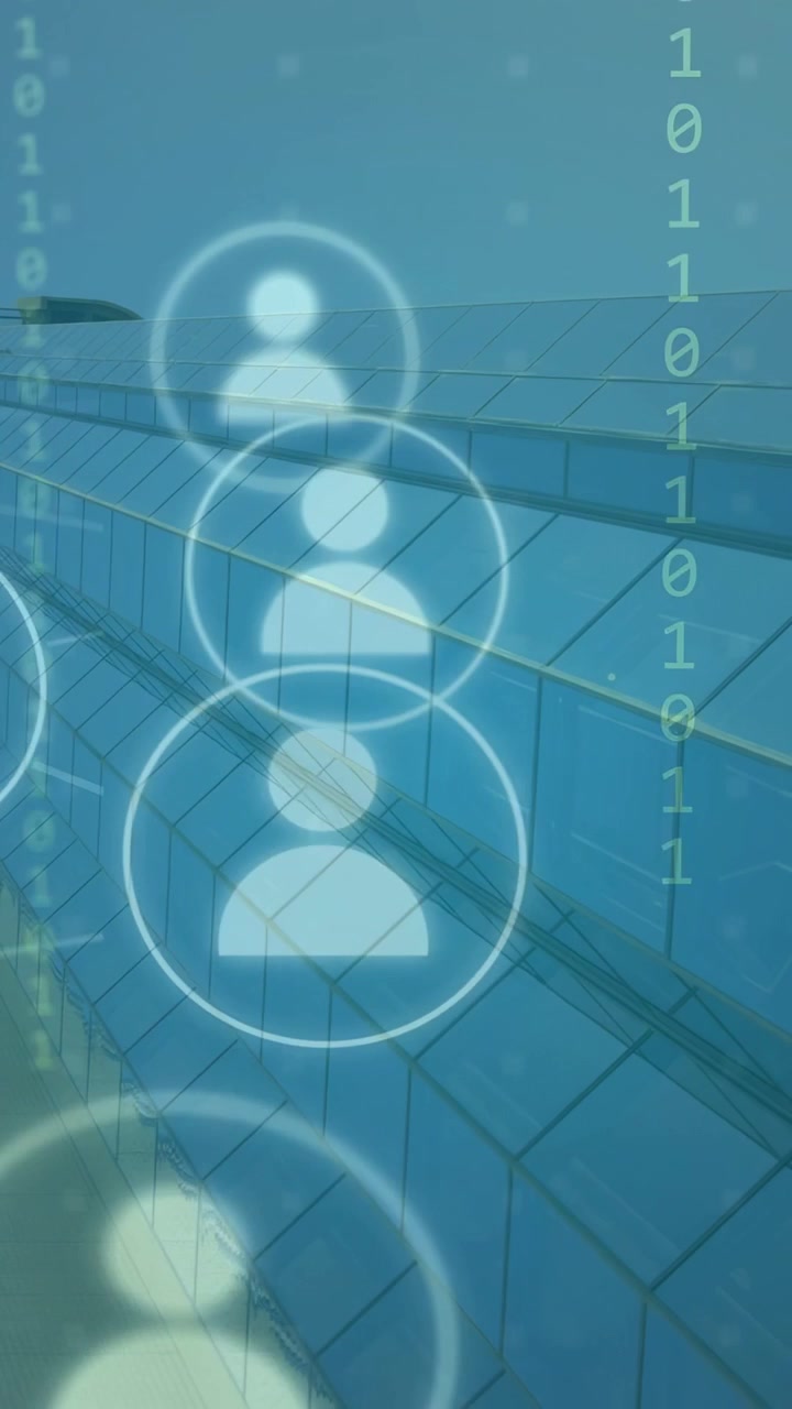 Video Verticale: Anello che Appare, Utenti che Iniziano a Svanire, Muovendosi Verso l'Interno, Formando una Rete di Bit sulla Facciata.
