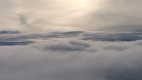 clouds sky viewed from the windows of an airplane. flying above the clouds, flying in the air.