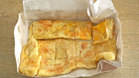 Roti-Frito-Con-Huevo-Y-Leche-Condensada-Azucarada