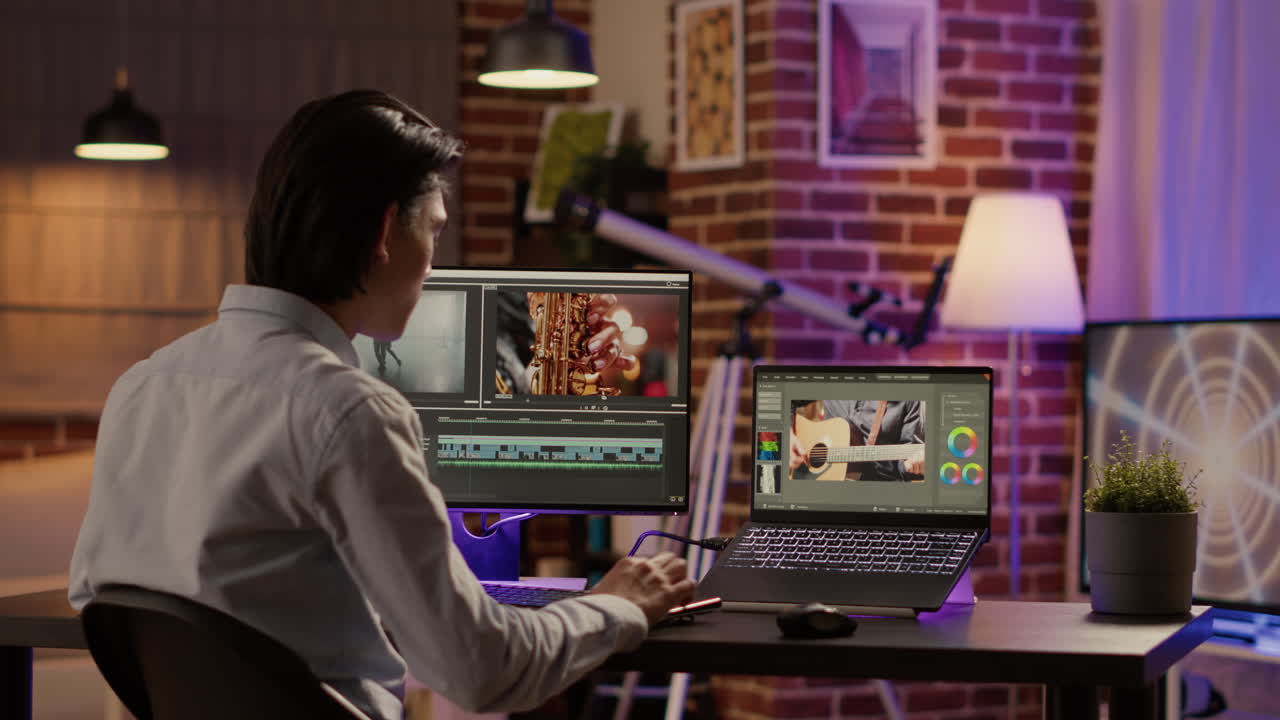 Man working on video editing at home office