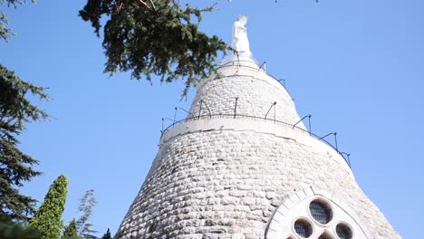 beautiful lady of lebanon monument statue in harissa, low angle reveal