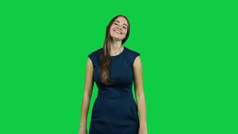 sexy attractive girl laughing and smiling in front of a green screen