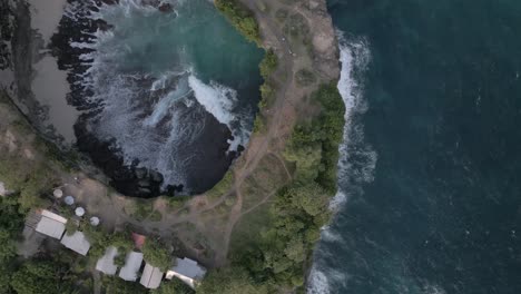 The-hole-in-the-roof-formation-at-Broken-Beach-on-rugged-Bali-coast