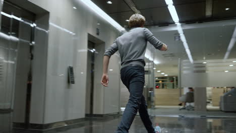 business people standing in elevator car. businessman running out of elevator