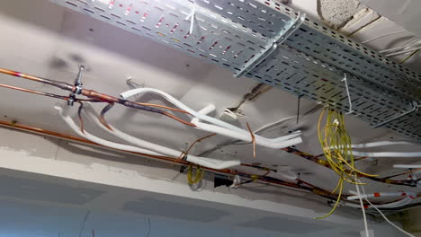 installation of ceiling-mounted pipes and cables