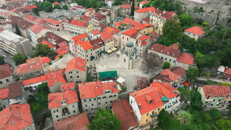 flight over herceg novi montenegro old town square with church; drone reveal