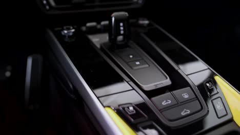 the interior of a sports car, automatic drive