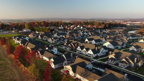 Aerial-of-new-housing-development-community-at-golden-hour