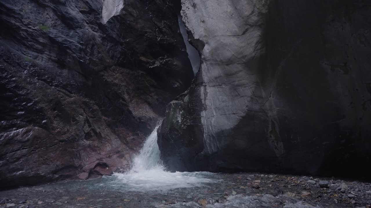 Waterfall in a rocky canyon
