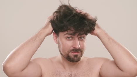 man styling his hair