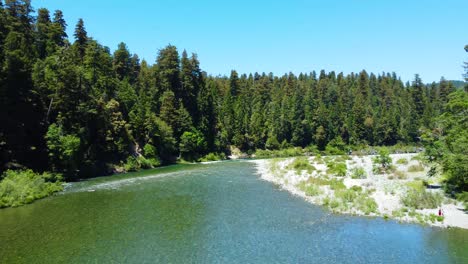 drone over emerald colored water