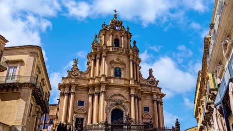 facade of the basilica of san giorgio, a religious building in modica, in ragusa, italy