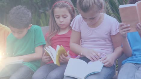 animación de un sendero de luz sobre diversos escolares leyendo libros