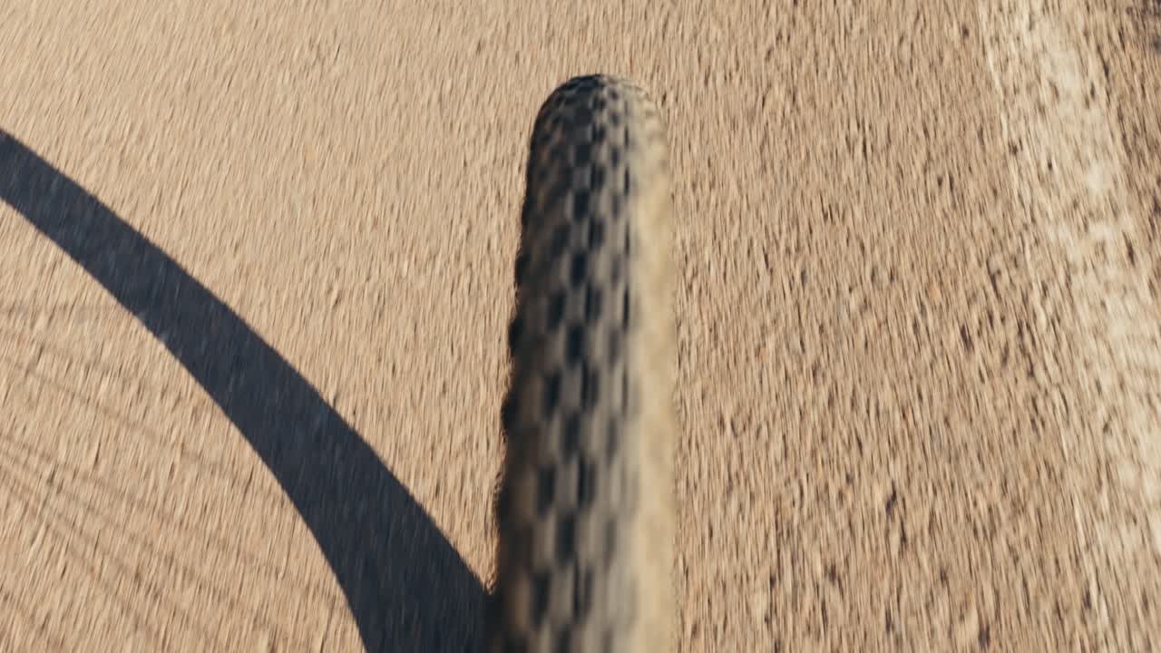 Close-up shot of a bicycle tire on the road