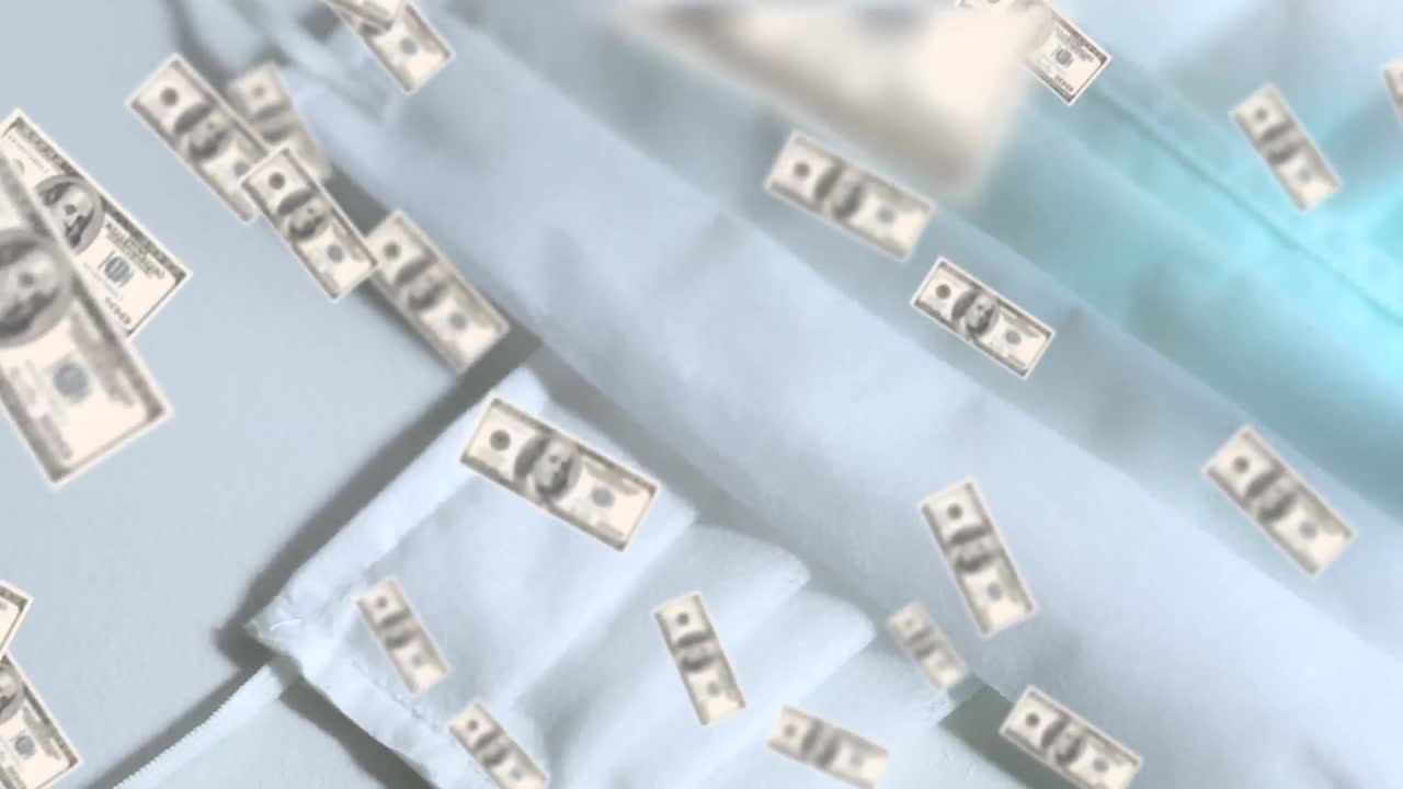 백그라운드에서 얼굴 마스크에 대해 움직이는 미국 달러 지폐의 디지털 복합 비디오