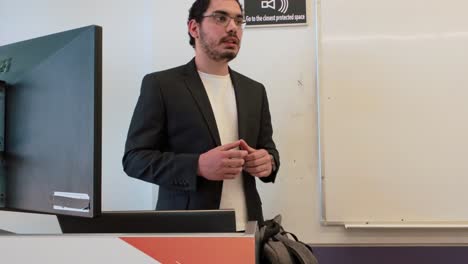 university lecturer delivering class