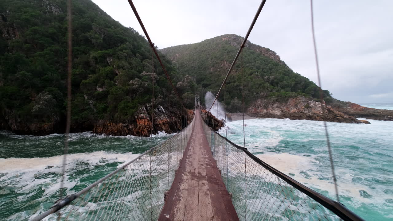 Scenic ecotourism attraction of Storms River Mouth suspension bridge Tsitsikamma