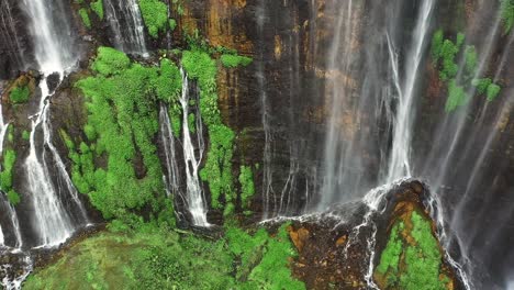 view from above, stunning aerial shot of the tumpak sewu waterfalls coban sewu