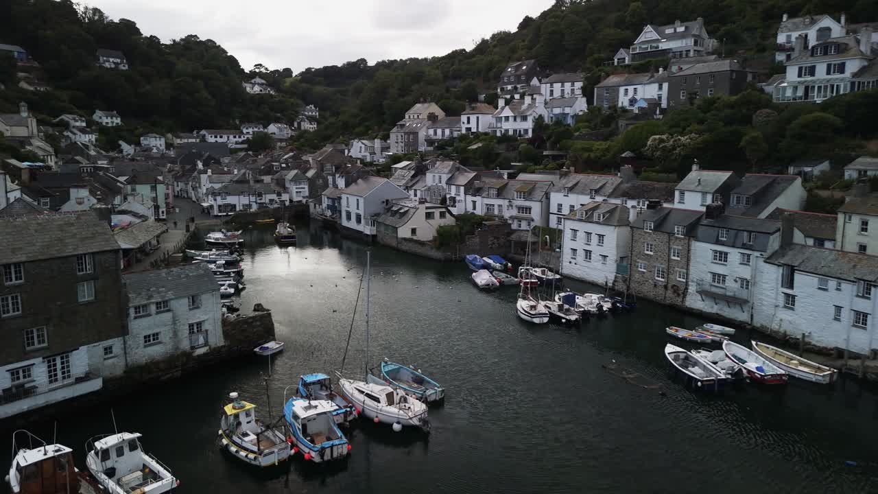 boats docked in the harbour of the famous fishing village of Polperro in Cornwall
