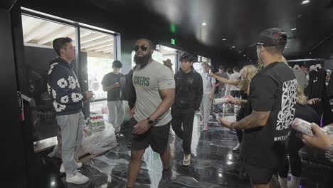 people waiting in line at an indoor event