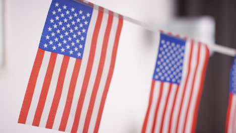 close up of american stars and stripes flag bunting for party celebrating 4th july independence day 4