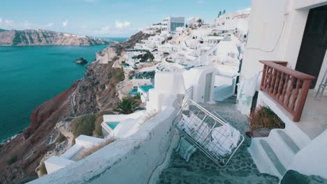 washed clothes fell on a street in oia, santorini