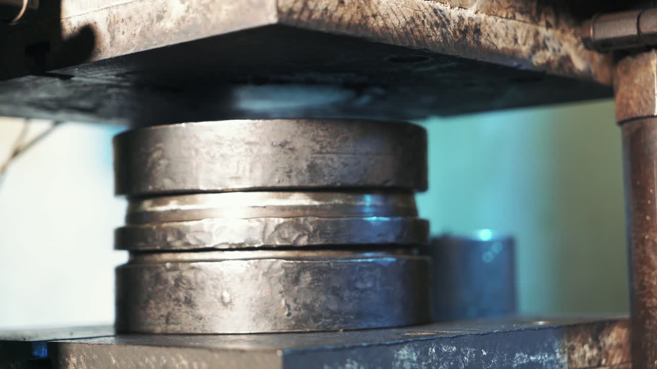 Automotive engine component. Close up of automotive part production by press process