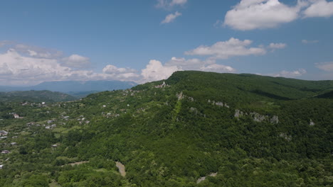 Lush-Green-Ukimerioni-Hill-Overlooking-Kutaisi-In-The-Imereti-Region-Of-Georgia-On-A-Sunny-Day