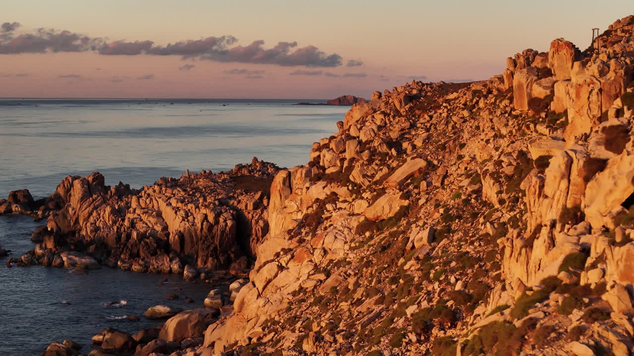 Beautiful Rock Formations And Towering Sea Walls In Central Vietnam; Close-up Aerial Views At Sunset.